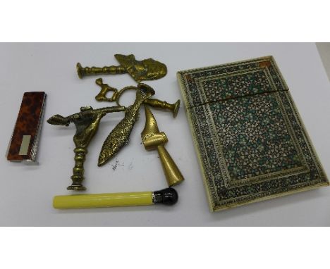An Anglo-Indian card case, a lighter in the form of a match, pipe tampers and a knife