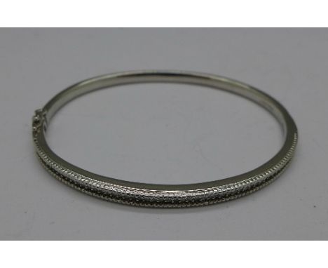 A silver and diamond bangle, 16.4g