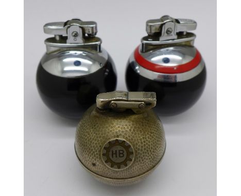 Two Ronson ball lighters and one other ball lighter