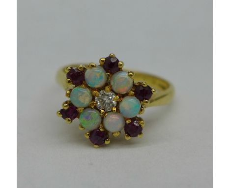 An 18ct gold, ruby, opal and diamond ring, 3.8g, L