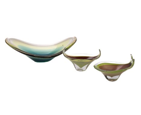 Three Flygsfors 'Couquille' dishes after a design by Paul Kedelv, of cased green, brown and clear somerso decoration, the lar