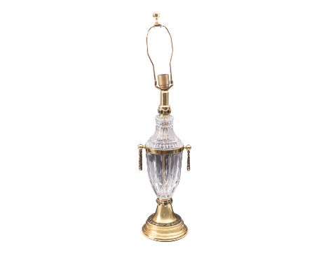 A moulded glass and gilt metal mounted table lamp modelled as an urn, modern; with fluted neck above a faceted body with twin
