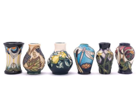 A set of six Moorcroft pottery miniatures, comprising a vase in the Lemon Hill pattern by Nicola Slaney, two vases with Viole