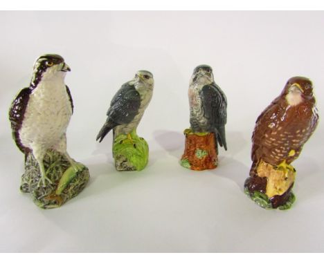 A set of four Beswick Beneagles scotch whiskey flasks in the form of birds of prey comprising the peregrine falcon, the merli