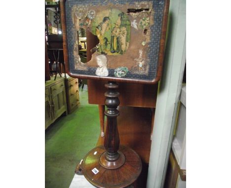 A 19th century rosewood veneered pole screen with partially turned column, disc shaped platform and scrolled feet together wi
