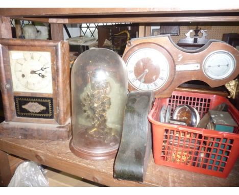A miscellaneous collection of clocks including two cuckoo clocks, skeleton clock, American mantle clock, etc