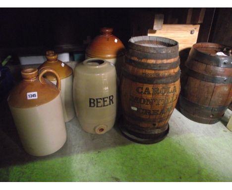 One lot of breweriana to include two coopered oak spirit barrels, one labelled Carola Montilla Cream, one raised on a pine fr
