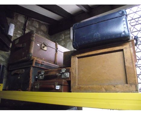 Two vintage fibre travelling trunks, one timber lathe bound, the other leather re-inforced, further items of luggage of varyi