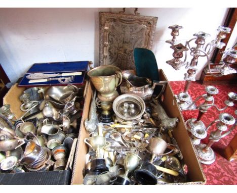 A large collection of silver plated wares to include a heavy five divisional candelabra on fluted stems, a pair of further th