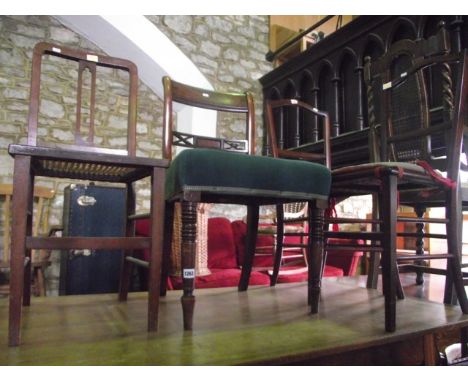 A Victorian walnut piano stool with circular button upholstered revolving adjustable seat, raised on a partially turned pilla
