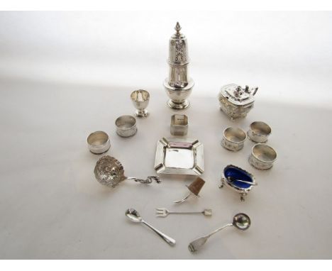 A George V silver sugar caster, C.S. Harris & Sons Ltd, London, 1933, the plain baluster body on spreading foot, removable pi