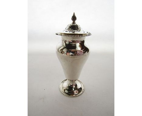 A George V silver sugar caster, Josiah Williams & Co., London, 1923, of plain baluster form, on a spreading foot with rope-tw