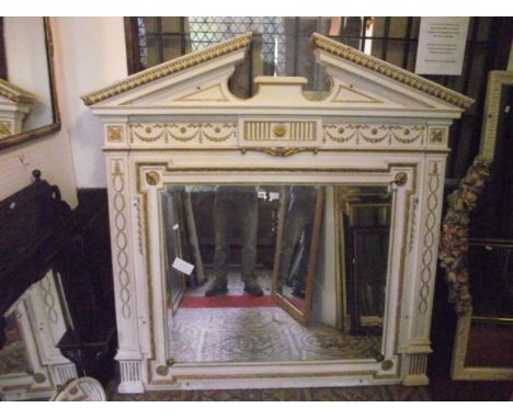 A large 19th century overmantle mirror of rectangular form, the bevelled edge plate set within an architectural moulded frame