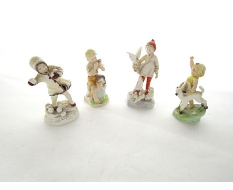 A collection of four Royal Worcester figures from the Months of the Year series comprising April 3416, June 3456, November 34