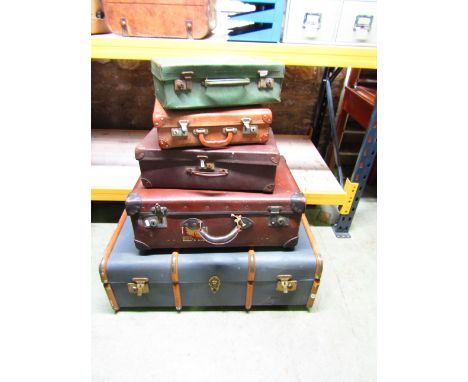 A vintage timber lathe and fibre cabin trunk together with four further items of luggage of varying size, mainly fibre and le