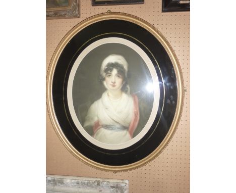 An early 20th century coloured engraving of oval form after Sir Thomas Lawrence PRA, showing a half length portrait of Mrs Si