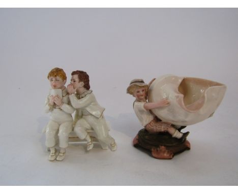 An unusual James Hadley Royal Worcester figure group of two boys seated on a bench and inscribed 'The Busy Whisper Circling R