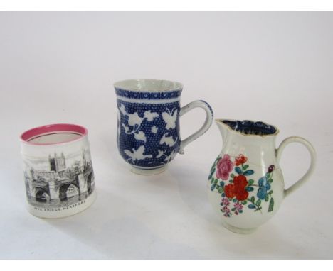 A late 18th century Chinese tankard with blue and white painted decoration incorporating a deer in a landscape setting and wi