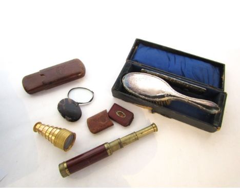 A mid 19th century gilded brass pocket six draw telescope with engine turned detail, a further telescope by Jones - London, w