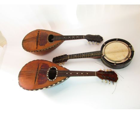 Two antique mandolins, each with tortoiseshell, mother of pearl and other inlay, with bone pegs together with a small eight s