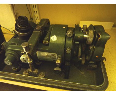 A vintage good quality metal cased surveying level unit together with a further cased Kern Swiss made surveying level, No 198