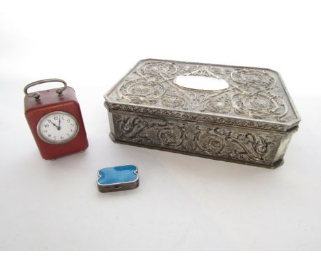 A small George V silver and enamelled box, S. Blanckensee & Sons Ltd, Chester, 1910, of shaped form, the cover with blue guil