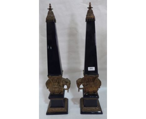 A pair of cobalt blue ceramic and gilt metal obelisks. Of recent manufacture. 26' high