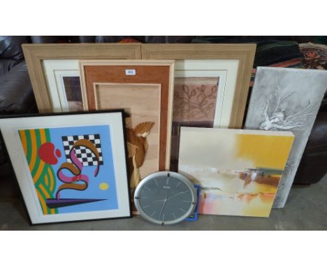 A quantity of pictures and a clock