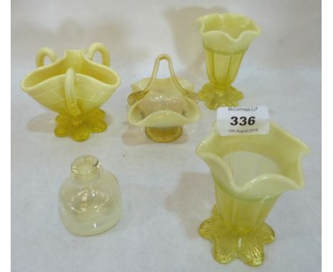 A Victorian vaseline glass epergne basket and four other items of vaseline glass 