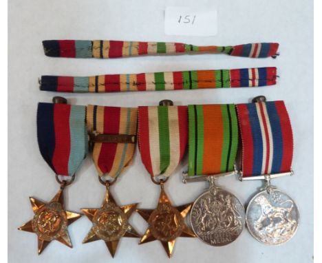 A World War II medal group: The Defence Medal; the Service Medal, The Italy Star; The Africa Star with 8th Army clasp and The