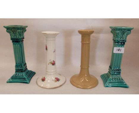 A pair of Wardle turquiose, glazed corinthian candlesticks 8½' high and two other ceramic examples