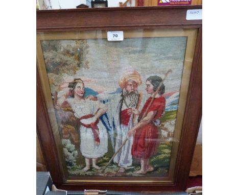 A Victorian woolwork tapestry. Religious figure scene. Oak framed. 19' x 14'