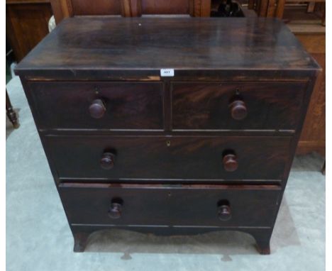 A George III mahogany chest of drawers on splayed bracket feet. 36' wide