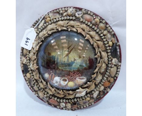 An Edwardian shell-work souvenir diorama with a marine lithograph in colours, mounted with shells and seaweed beneath convex 