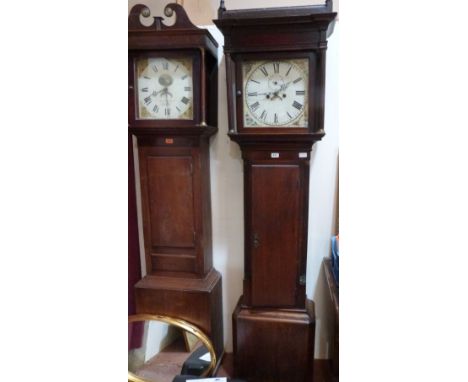 A late 18th century oak and mahogany longcase clock with 8 day movement, the dial painted with roses to the spandrels. 85' hi