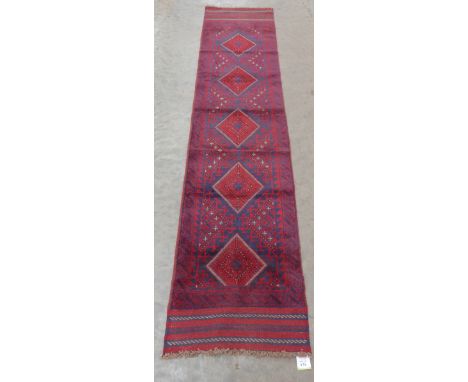 A Meshwani carpet runner. 2.66m x 0.61m