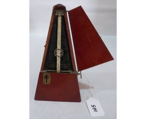 A metronome by The John Church Co. Movement runs