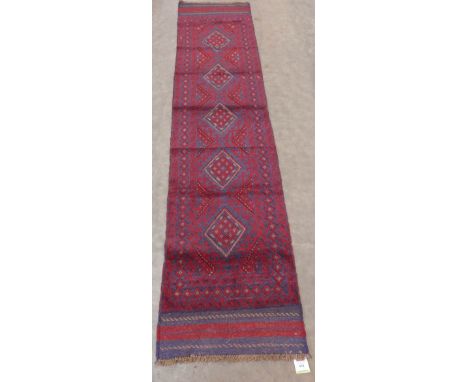 A Meshwani carpet runner. 2.63m x 0.61m