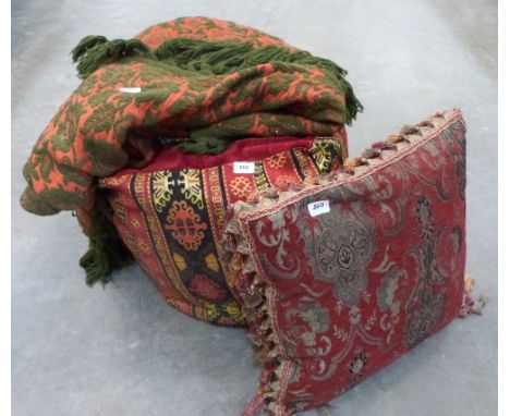 A sofa throw, a large cushion and a pouffe cushion