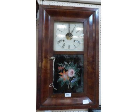An American mahogany cased wall clock with two train weight driven movement. 25½' high