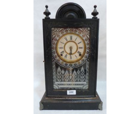 An American ebonised mantle clock. 17' high