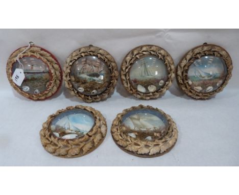 A group of six Edwardian shell-work souvenir dioramas, each with a lithograph in colours depicting shipping, mounted with she