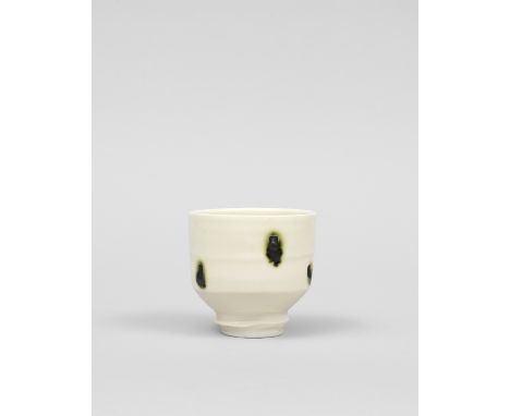 Edmund de WaalFooted cup, circa 1990Porcelain, cream celadon glaze with vivid green splashes. 8.7 cm high, 9 cm diameter Impr