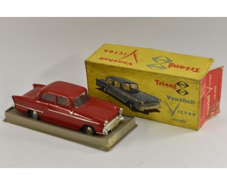 Triang Minic  - a Vauxhall Victor, 1/20 scale electric model car , vibrant red plastic body, tartan pattern tin interior, sil