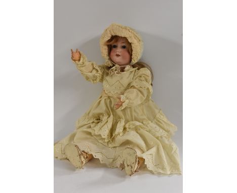 Armand Marseille - a 390 9 bisque head socket doll, sleeping blue grey eyes, open mouth, light brown wig, composite body and 