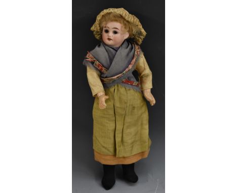 A late 19th century bisque socket head doll, brown eyes, open mouth, curly light brown/blond hair,  composite body and limbs,