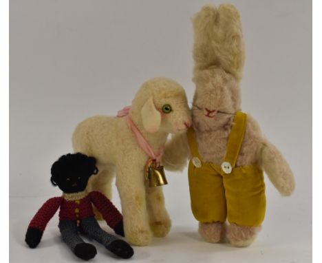 A Norah Wellings white rabbit,  with yellow velvet dungarees, 21cm high. label to foot;  a Steiff (Germany) white mohair Lamb