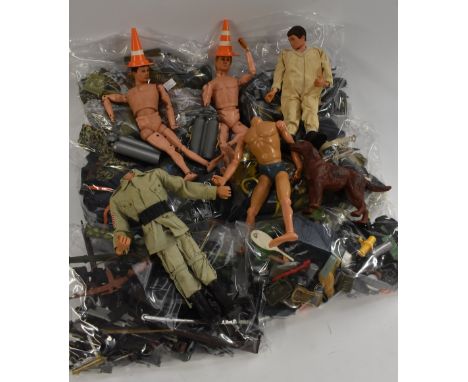 Actionman - a large collection of vintage Actionman dolls and accessories inc  Machine guns, rifles, pistols, etc, uniforms, 