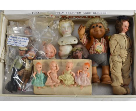 Dolls - a small Steiff rubber Macki doll, 971270, with card tag and label;  another smaller similar smoking a pipe, unmarked;