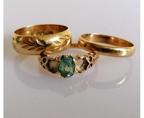 Two gold wedding bands, one with etched decoration and a gem-set ring (two stones missing), all hallmarked 9ct, sizes M, L, K